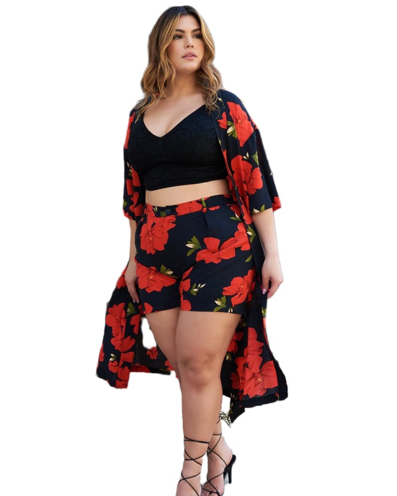Front of a model wearing a size 5X Maribel Floral Print Shorts W. Pockets in Black by Rebdolls. | dia_product_style_image_id:321986